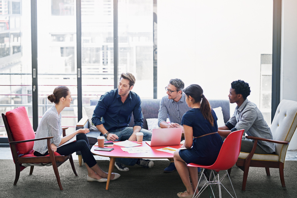 Office professionals in a team meeting.