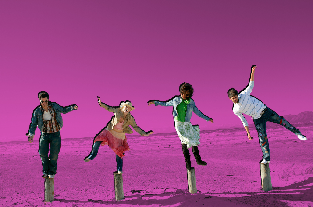 Four people balancing on posts at the beach, representing the balance between successful employee retention strategies and turnover