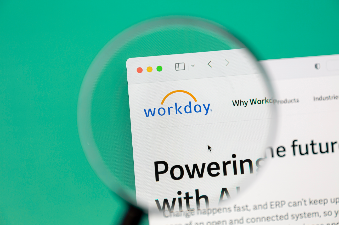 Workday homepage image under a magnifying glass signifying the discrimination lawsuit they are currently facing